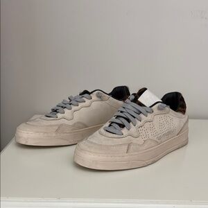 P448 Cream grey sneakers with cheetah pony hair accents.